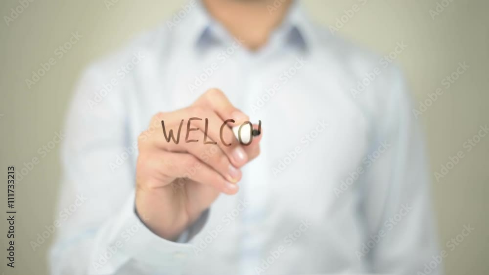 Welcome, Man Writing on Transparent Screen Welcome, Man Writing on Transparent Screen