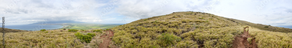 A panorama near the top of an island mountain overlooking an ocean inlet. A panorama near the top of an island mountain overlooking an ocean inlet.