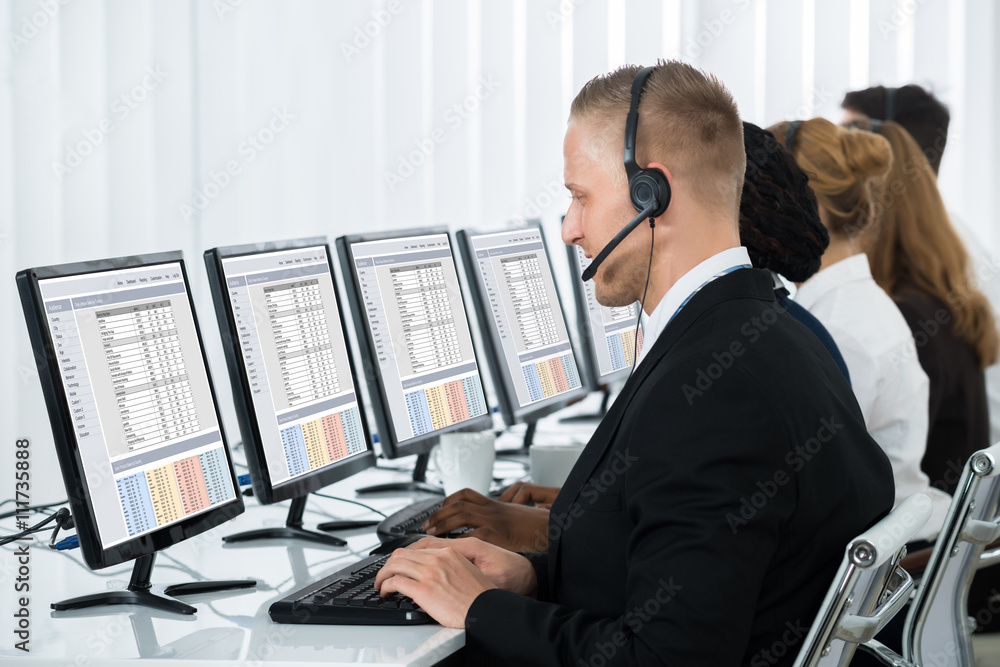 Businesspeople Working In Call Center Businesspeople Working In Call Center
