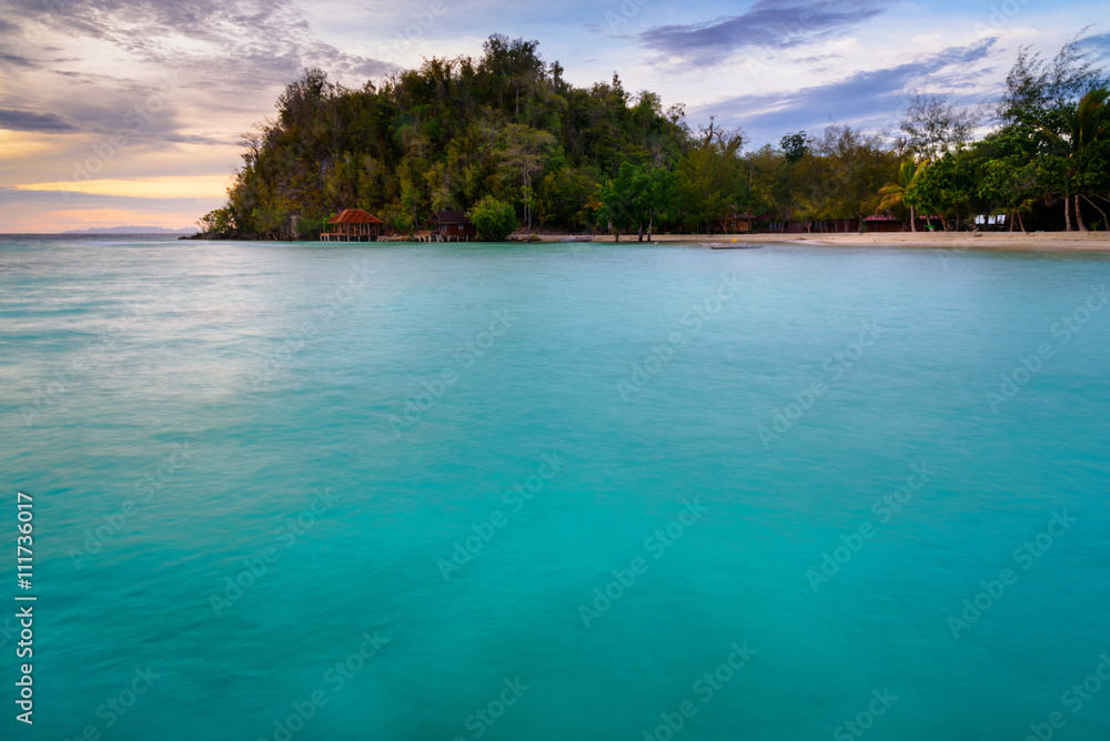 Fototapeta premium Beach on Bolilanga Island at sunset