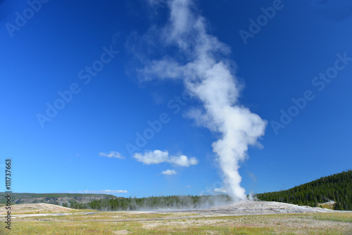  Old Faithful geyser erupting.