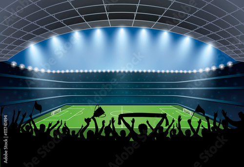 Excited crowd of people at a soccer stadium. Football stadium.