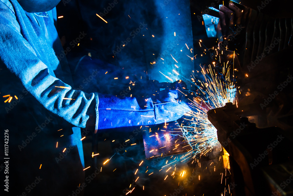 © wi6995 - welder Industrial automotive part in factory © wi6995 - welder Industrial automotive part in factory
