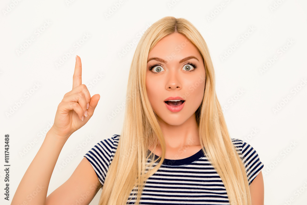 Smart genius woman with raised finger having an ide Smart genius woman with raised finger having an ide