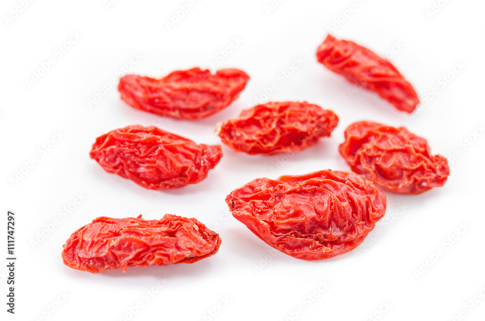 Close up goji berries on white. Close up goji berries on white.