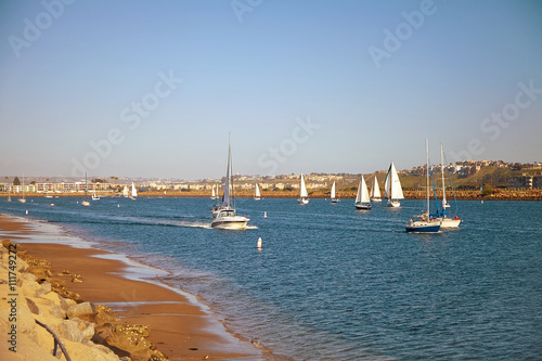 Sailboats back to the Marina Del Rey in California