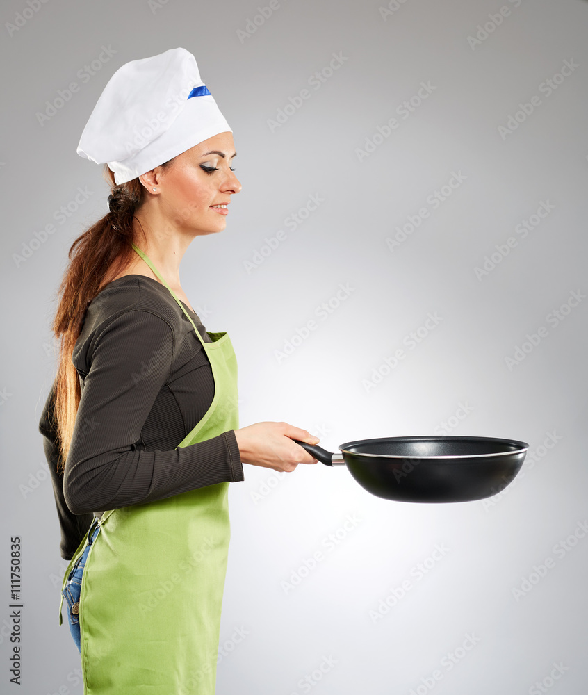 Woman chef with a wok