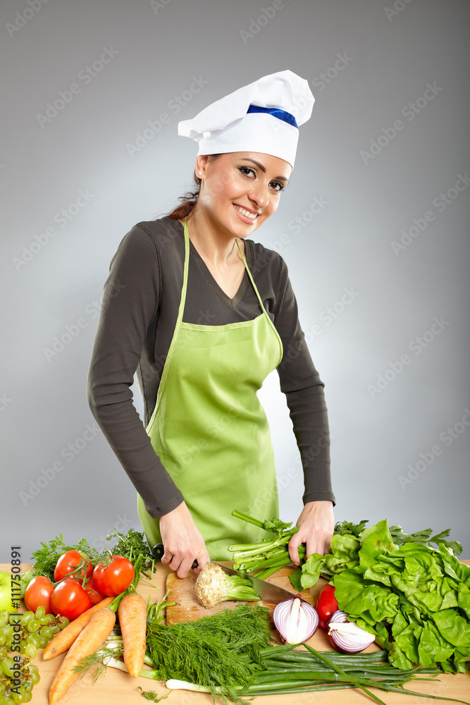 Woman chef chopping vegetables Woman chef chopping vegetables