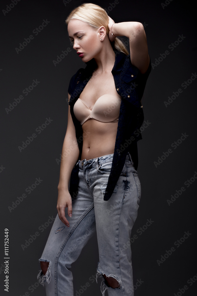 sexy fashion model with long hair, young European attractive, beautiful eyes, full lips, perfect skin is posing in studio for glamour vogue test photo shoot showing different poses sexy fashion model with long hair, young European attractive, beautiful eyes, full lips, perfect skin is posing in studio for glamour vogue test photo shoot showing different poses