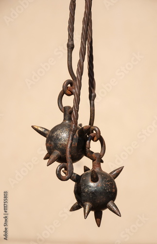 ancient iron cannon with thorns and chain - mace