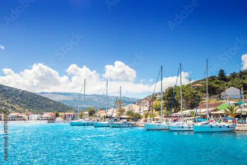 Sailboat harbor in small seaside town, Kefalonia Greece