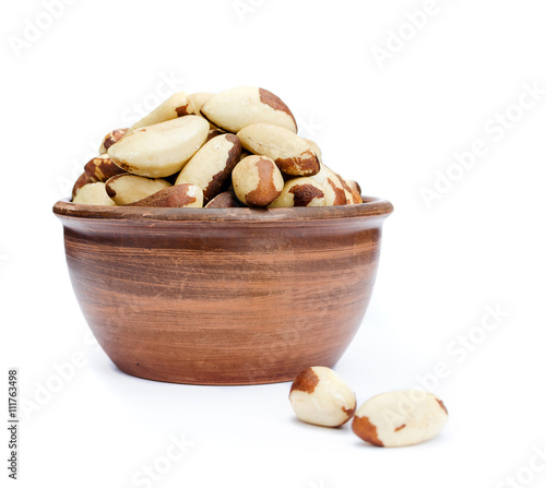 Brazil nuts in a bowl isolated