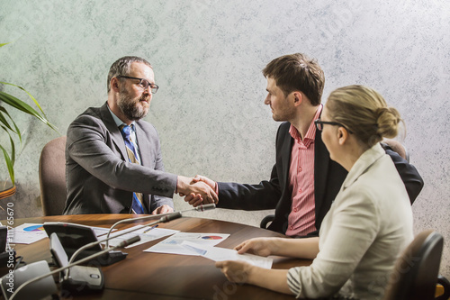 Bilde på lerret handshake on business meeting at office at the conclusion of the contract