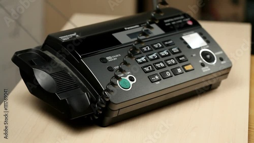 Close-up shot of man's hands which is calling by telephone.