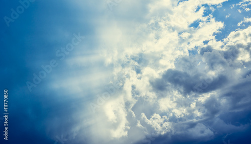 Fototapeta Naklejka Na Ścianę i Meble -  Cloudy sky with sun rays, nature background