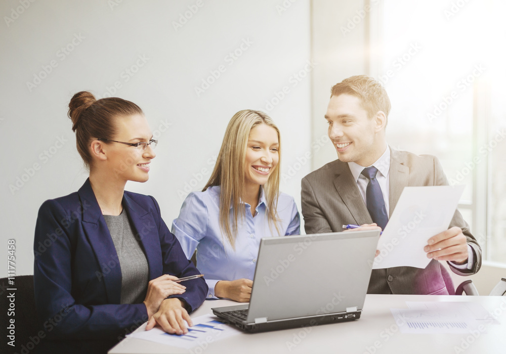 business team with laptop having discussion business team with laptop having discussion