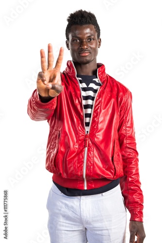 Handsome black man counting three