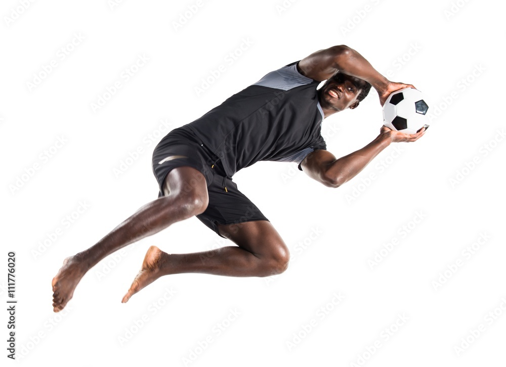 Fototapeta premium Black man playing football