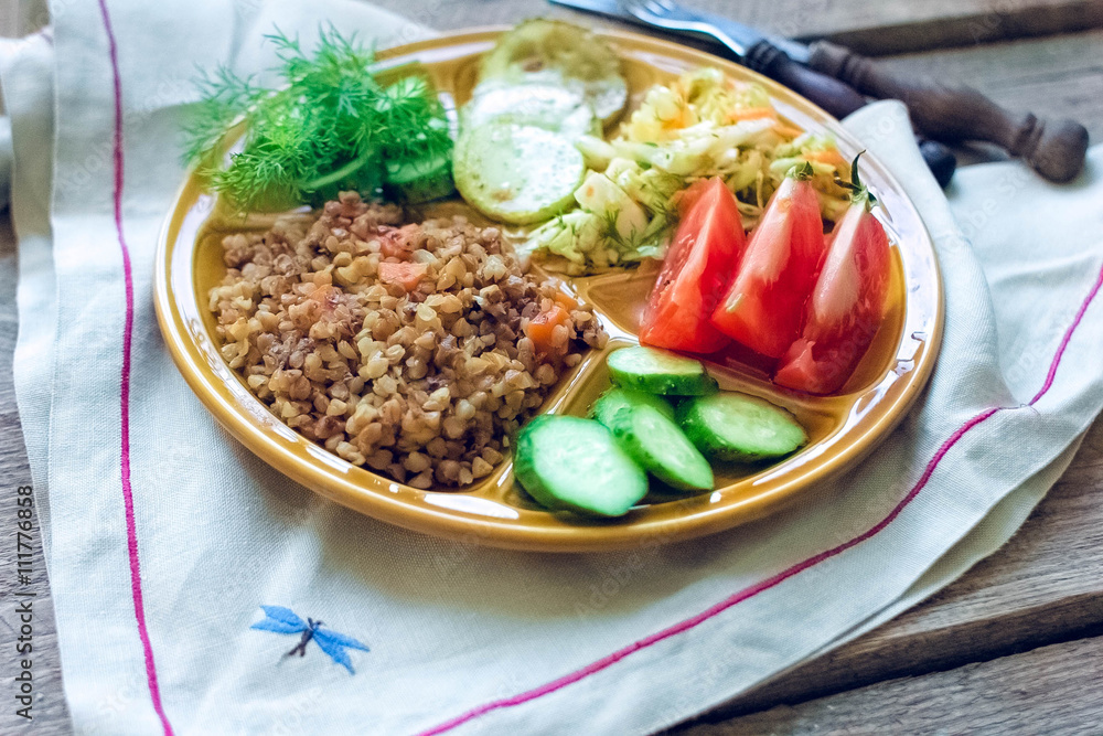 buckwheat garnish with salad and vegetables buckwheat garnish with salad and vegetables