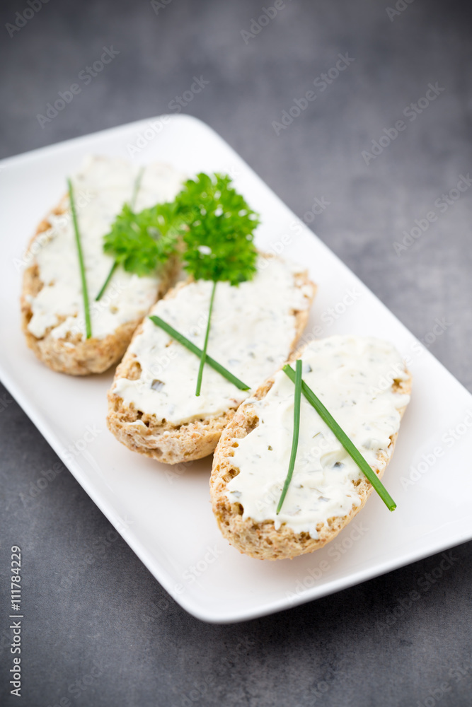 Crispbread with soft cheese with herbs and bacon. Crispbread with soft cheese with herbs and bacon.