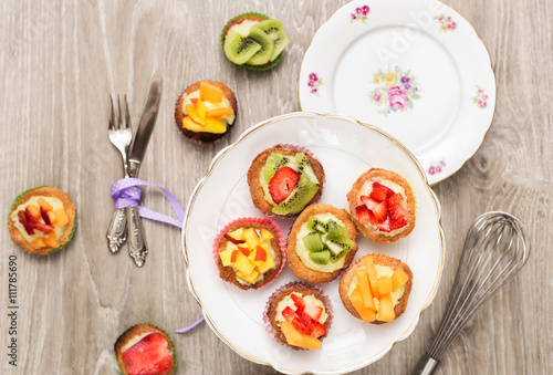 top view of mini pastry with custard cream and fresh fruits