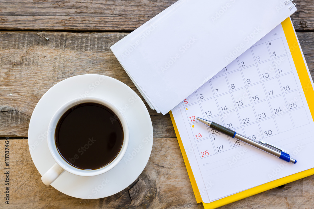 cup of coffee with paper note on wood table background cup of coffee with paper note on wood table background