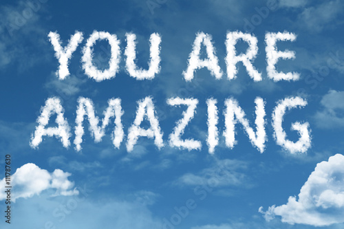 Fotografie You Are Amazing cloud word with a blue sky