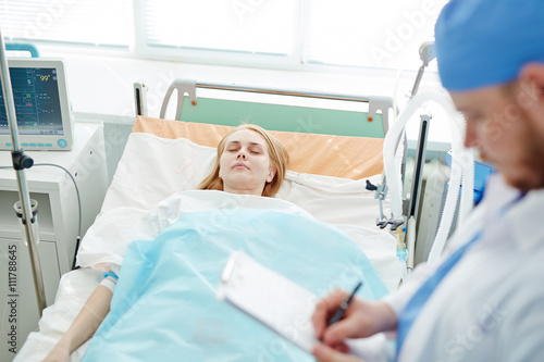 Young woman lying in icu