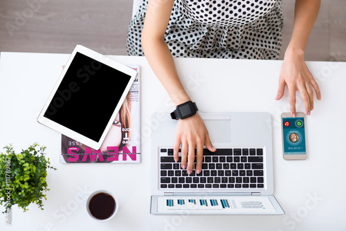 Nice woman working on the laptop 