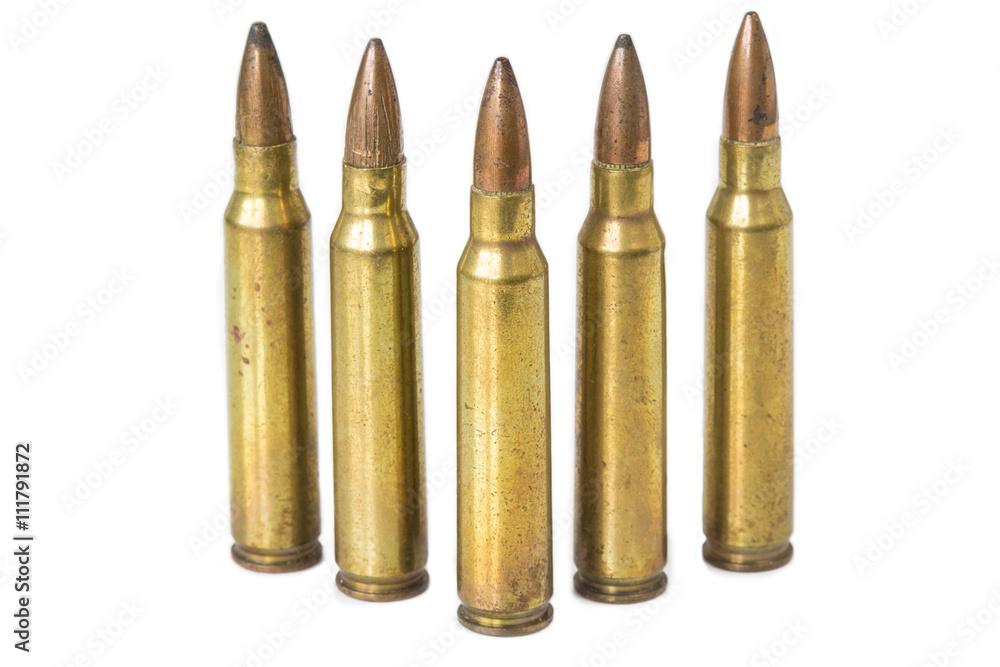 Old rifle bullet isolated on white background with selective foc Old rifle bullet isolated on white background with selective foc