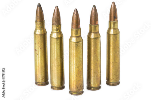 Old rifle bullet isolated on white background with selective foc