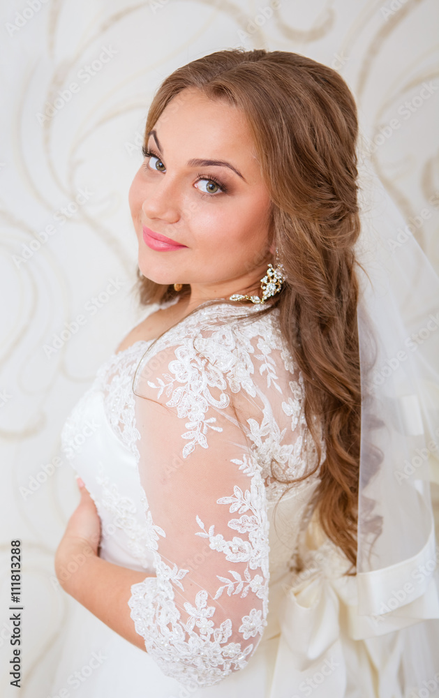Closeup portrait of young beautiful bride in her wedding day Closeup portrait of young beautiful bride in her wedding day