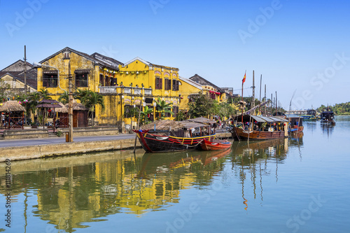 Traditional boats on the Thu Bon River in Hoi An Ancient Town, Central Vietnam.