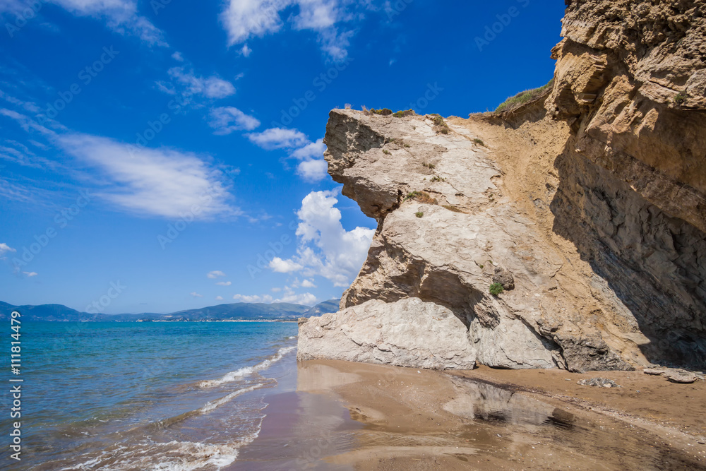 Sandy beach with monumental rocks Kalamaki Zakynthos Greece