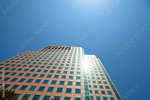 Office building on sky background.