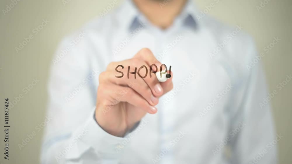 Shopping App, man writing on transparent screen Shopping App, man writing on transparent screen