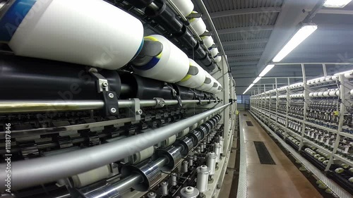 Winding Fibers on Spools in Textile Factory / Close up of manufacturing process in textile industry. HD1080p.