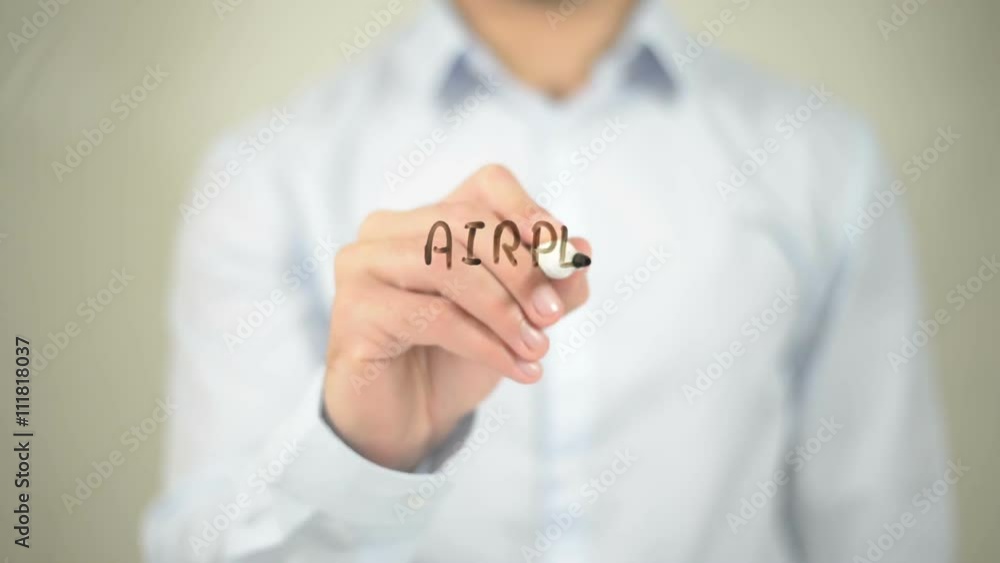Airplane Ticket, man writing on transparent screen Airplane Ticket, man writing on transparent screen