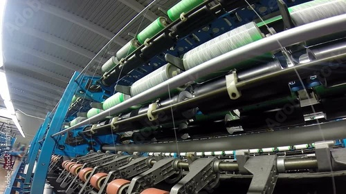 Winding the Yarn Onto Special Perforated Cones /Automated machines for yarn manufacturing in a textile factory. HD1080p. 