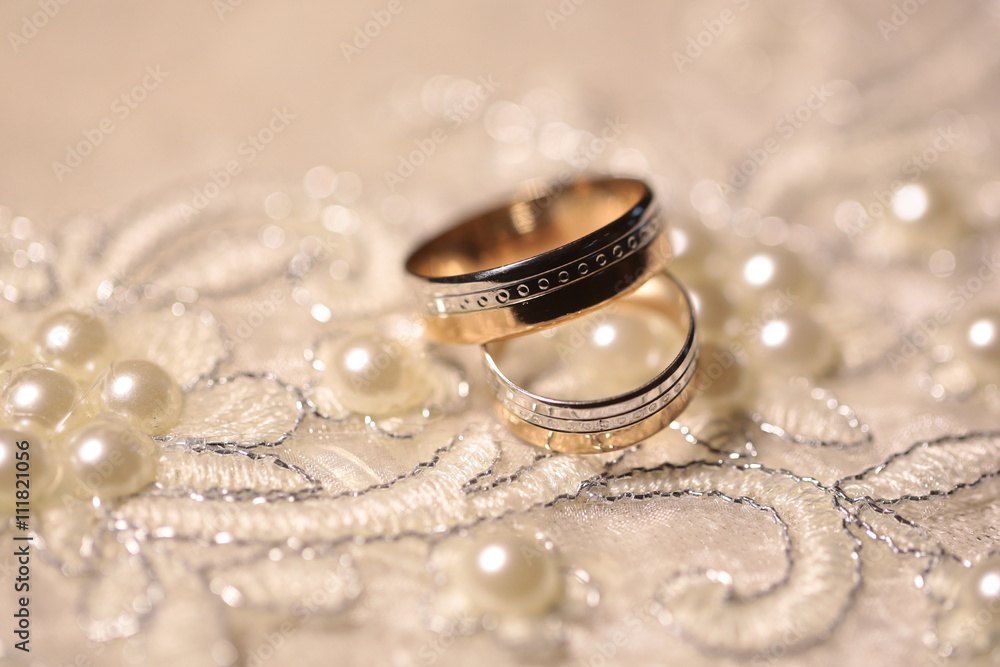 Wedding bands on embroidered cloth Wedding bands on embroidered cloth
