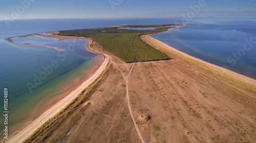 A long part of the Kiipsaare island. Seen the small green plants on the island as part of the tourism for the town photo