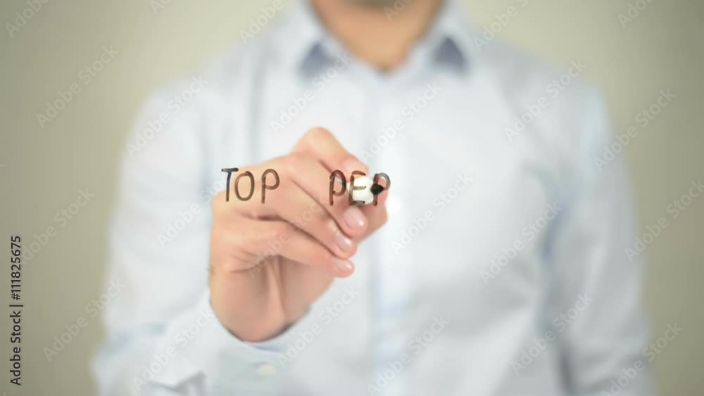 Top Performers , man writing on transparent screen Top Performers , man writing on transparent screen