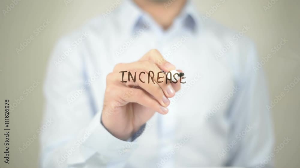 Increase Confidence, man writing on transparent screen Increase Confidence, man writing on transparent screen