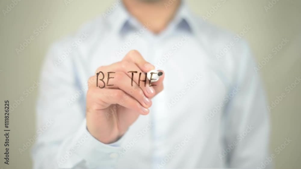 Be the Best, man writing on transparent screen Be the Best, man writing on transparent screen