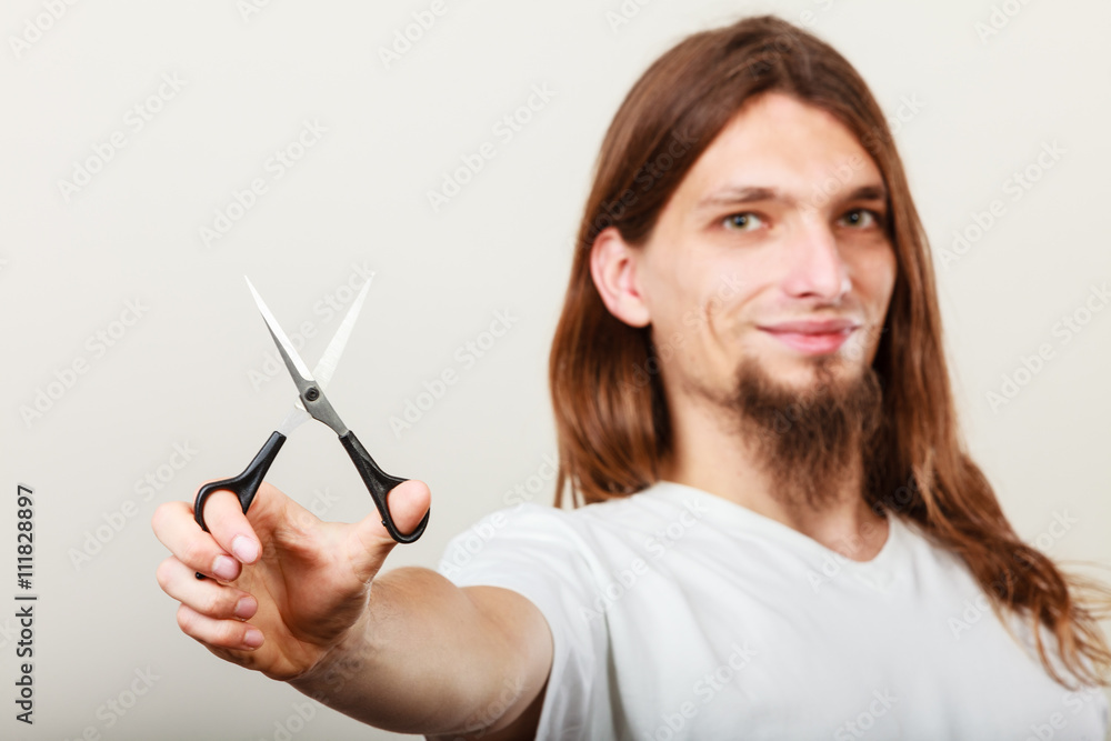 Hairstylist with scissors in hand Hairstylist with scissors in hand