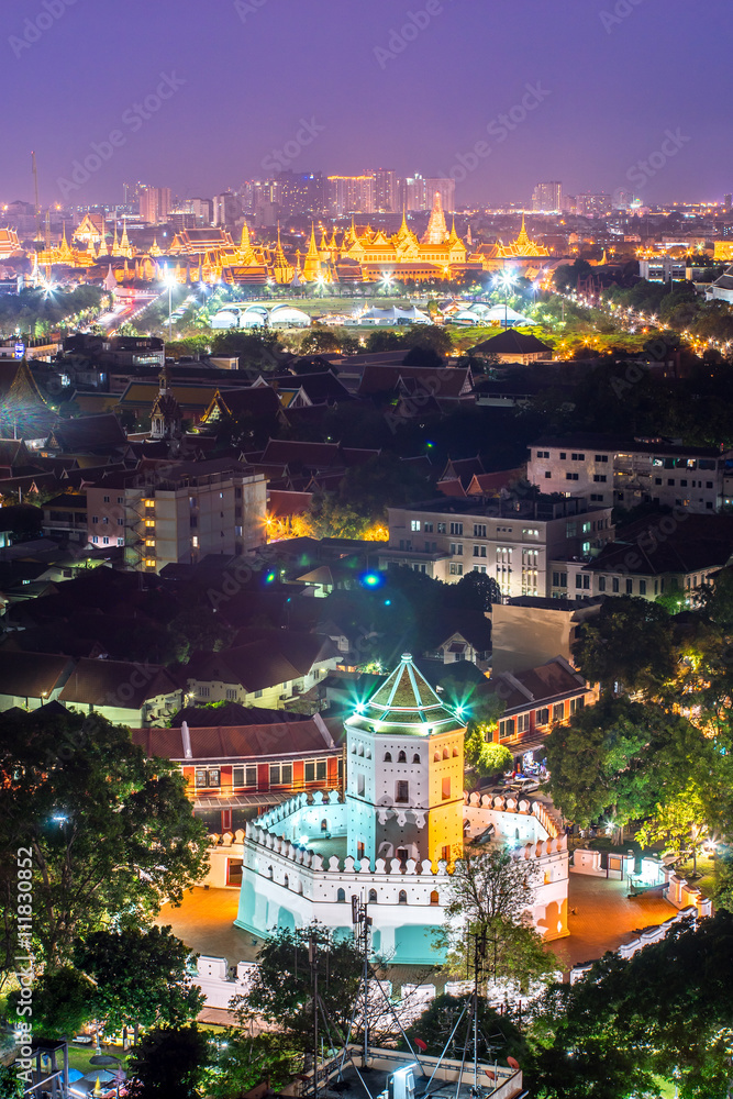 Phra Sumen Fort with grand palace at night , Bangkok Thailand .
