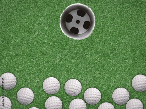 top view golf balls with golf cup on green background