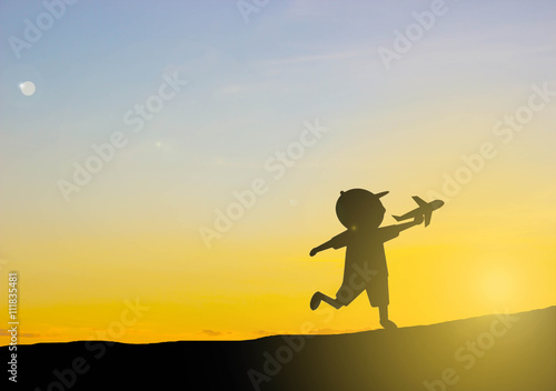 silhouette Kids play Play plane with sunset