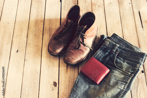 Vintage,Jean,leather shoes and Wallet on wood background