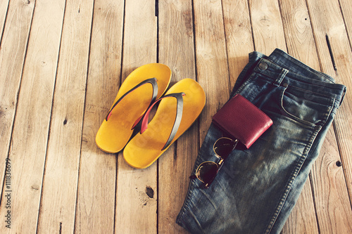 Vintage,Jean,slippers,Wallet and sunglasses on wood background